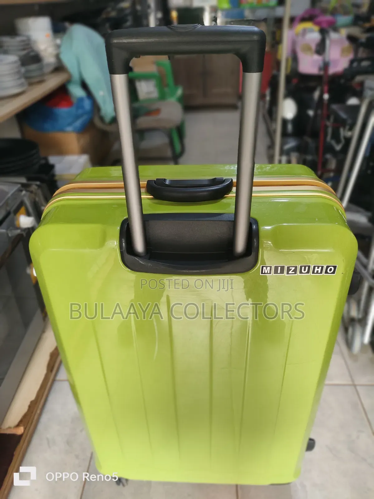 Japanese Bright Green Hardside Suitcase Is From the Brand Wintaro.
