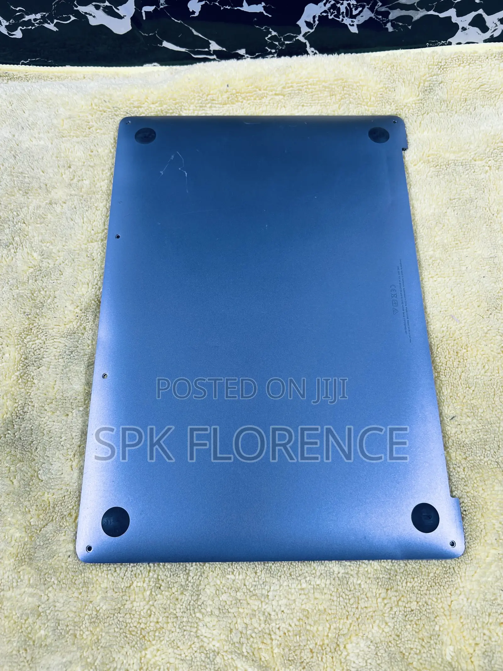 Bottom Case (Or Lower Panel) of an Apple Macbook Laptop.