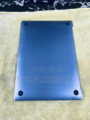 Bottom Case (Or Lower Panel) of an Apple Macbook Laptop.