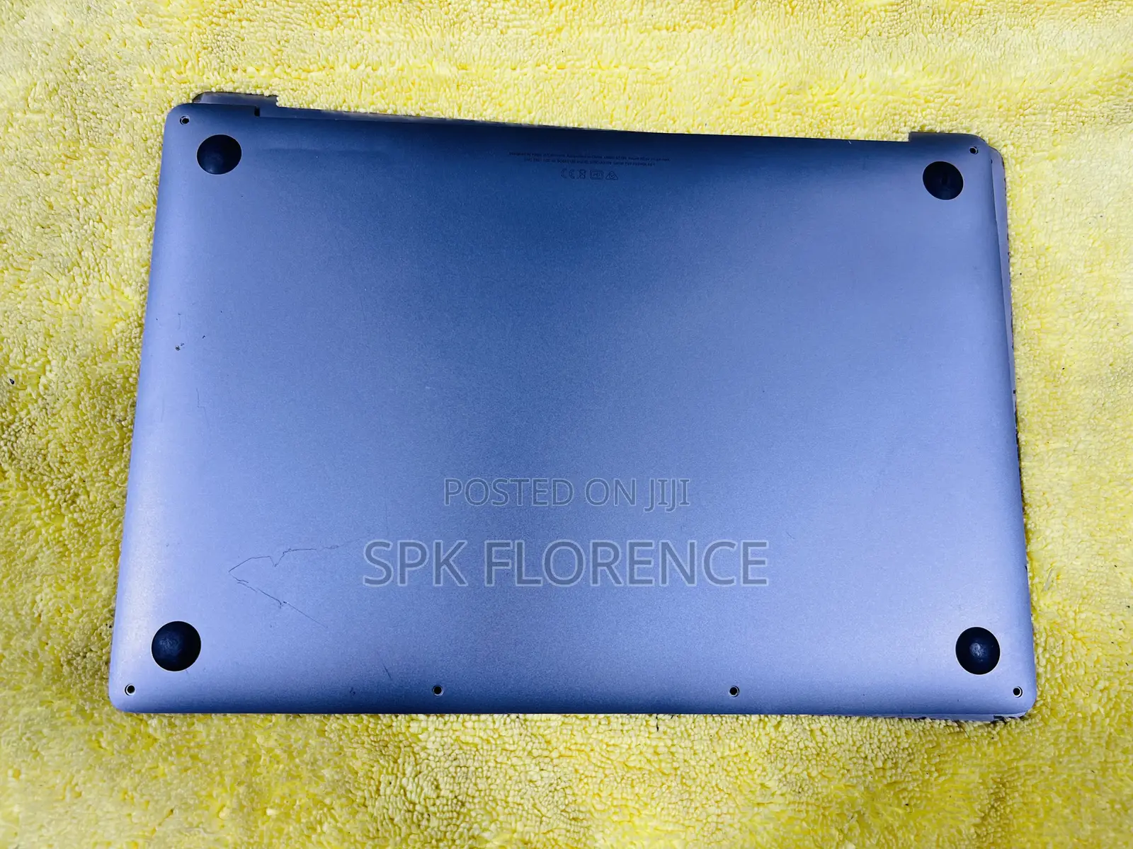 Bottom Case (Or Lower Panel) of an Apple Macbook Laptop.