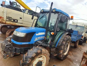 New Holland Tractor Tt 65 With Trailer