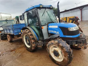 New Holland Tractor Tt 65 With Trailer