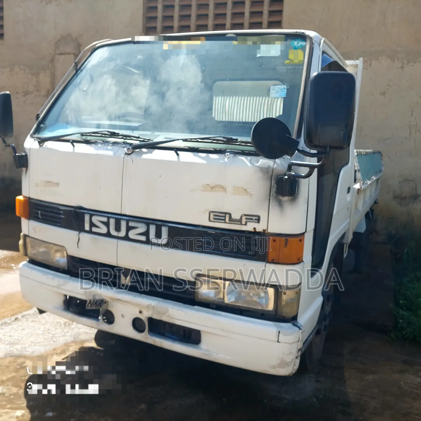 Isuzu Elf Tipper