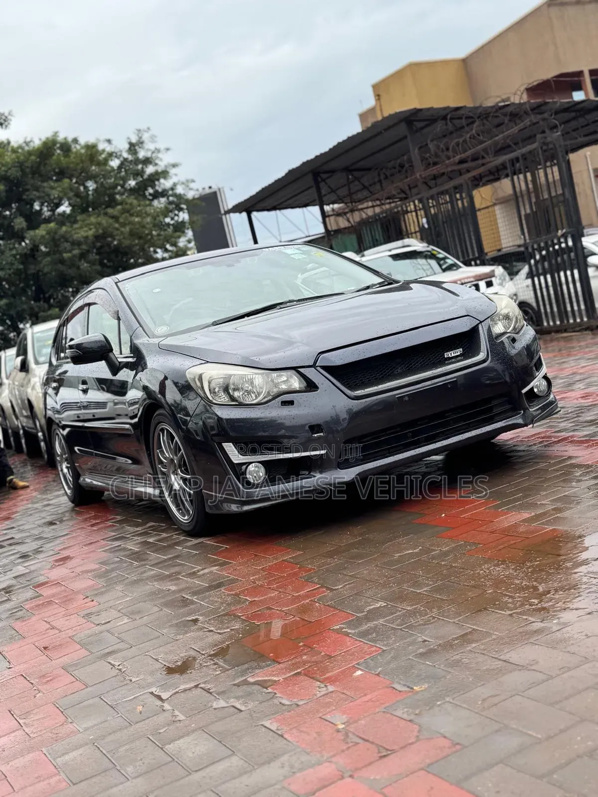 Subaru Impreza 2.0i Sport Premium PZEV 4dr Hatchback AWD (2.0L 4cyl 5M)