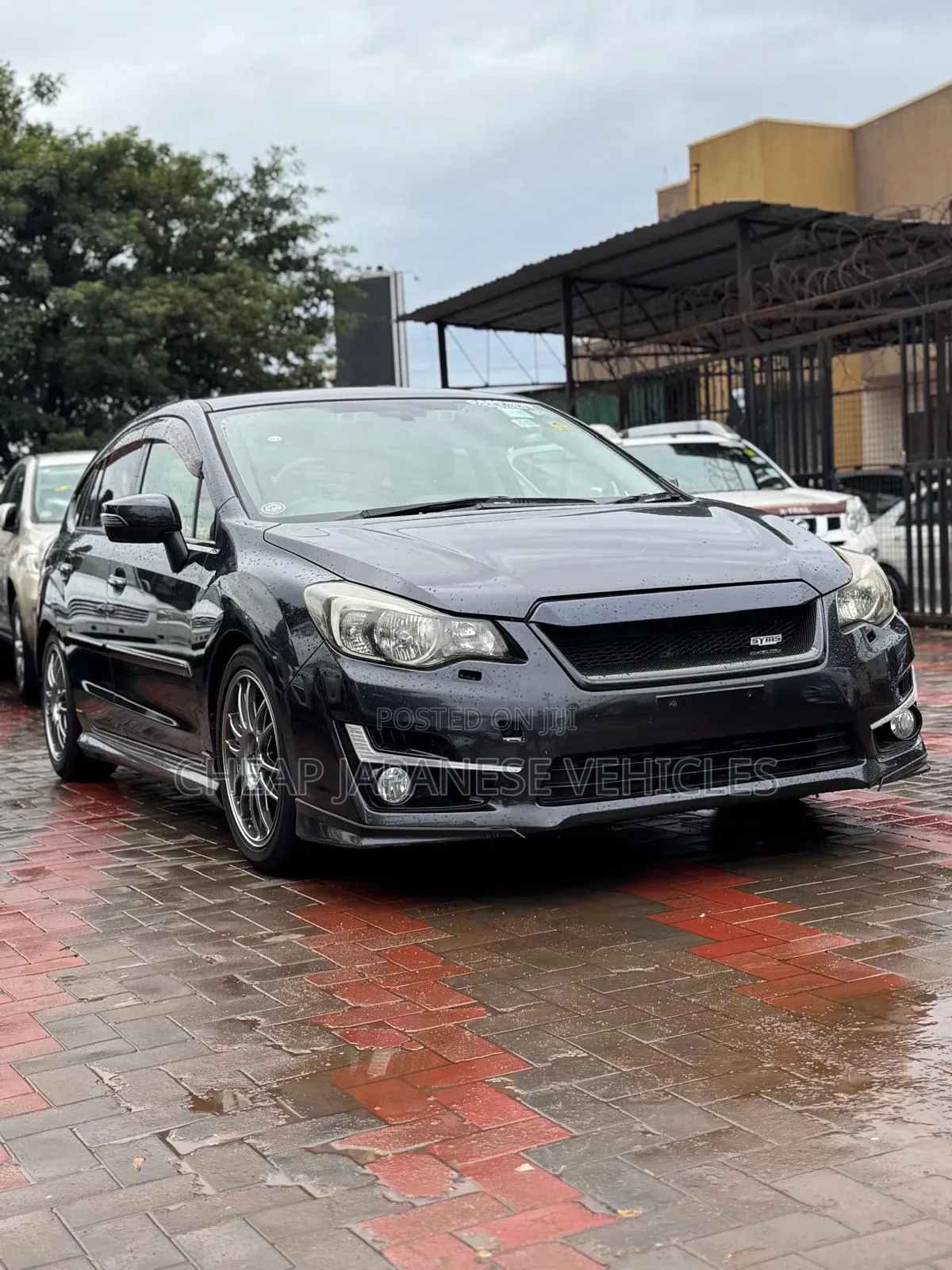 Subaru Impreza 2.0i Sport Premium PZEV 4dr Hatchback AWD (2.0L 4cyl 5M)