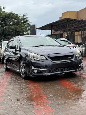 Subaru Impreza 2.0i Sport Premium PZEV 4dr Hatchback AWD (2.0L 4cyl 5M)