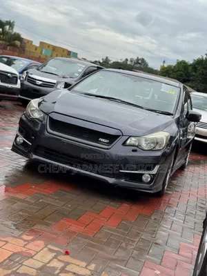 Subaru Impreza 2.0i Sport Premium PZEV 4dr Hatchback AWD (2.0L 4cyl 5M)