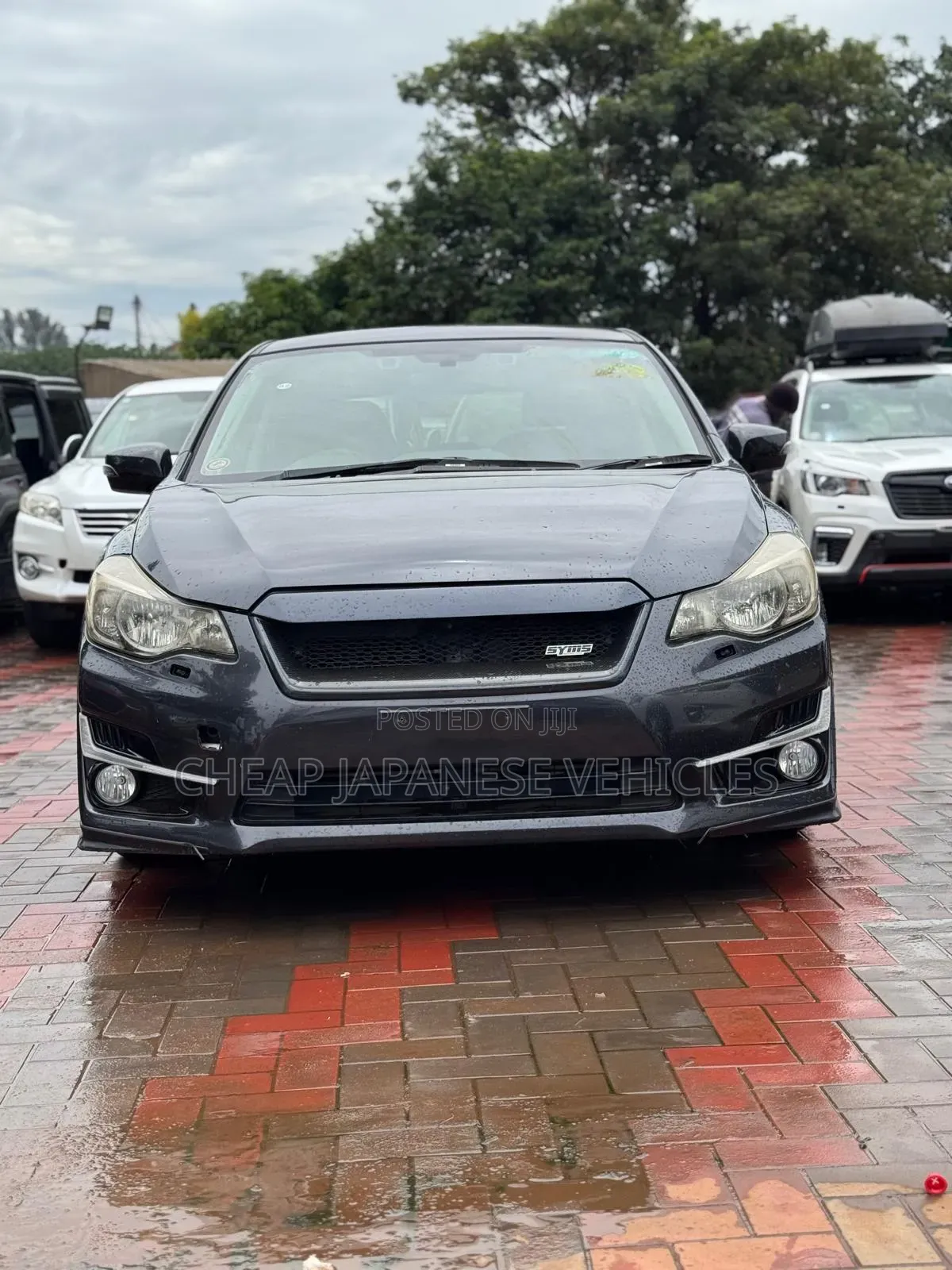 Subaru Impreza 2.0i Sport Premium PZEV 4dr Hatchback AWD (2.0L 4cyl 5M)