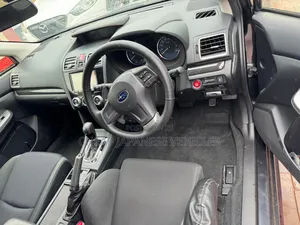 Subaru Impreza 2.0i Sport Premium PZEV 4dr Hatchback AWD (2.0L 4cyl 5M)
