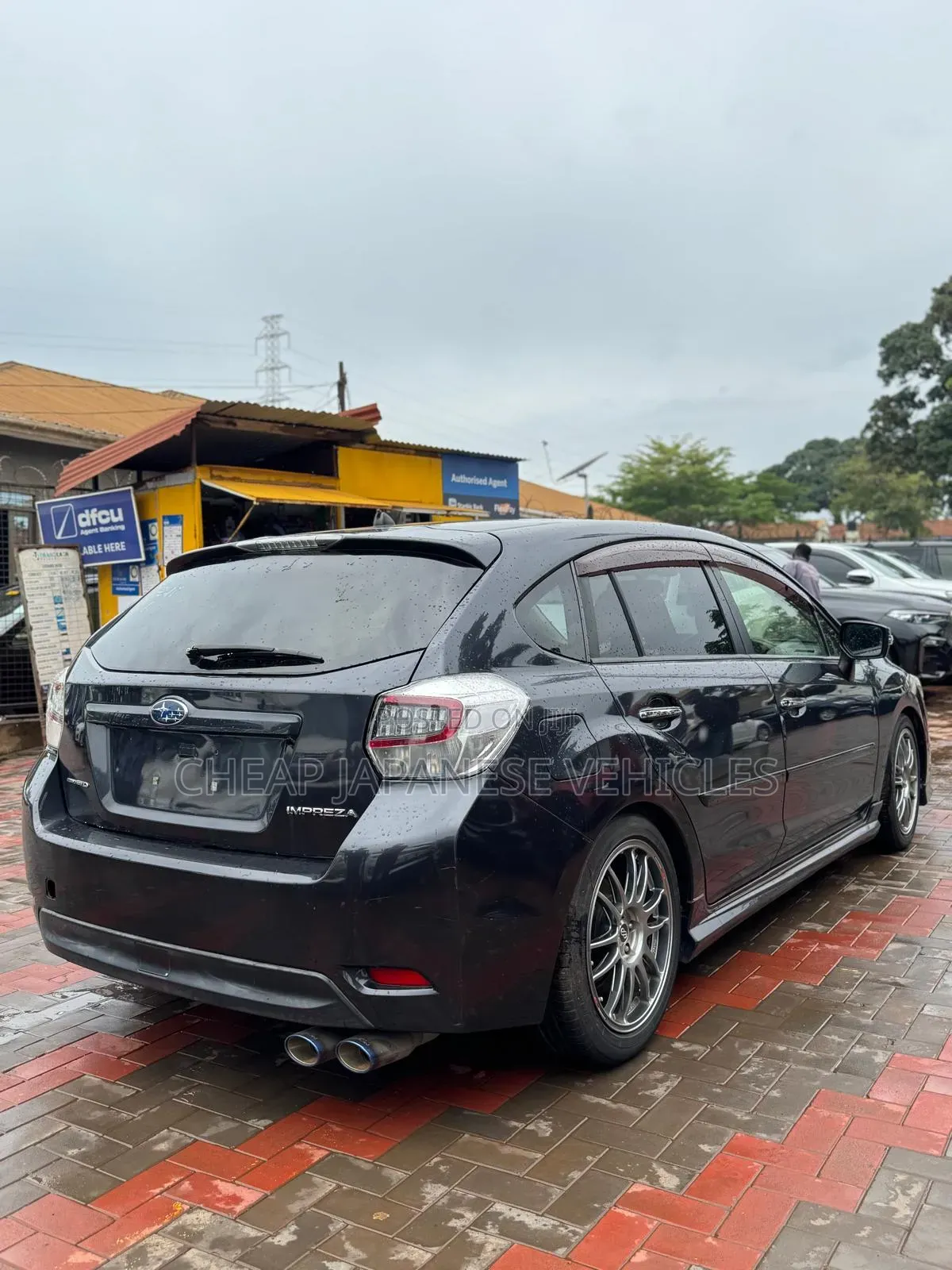 Subaru Impreza 2.0i Sport Premium PZEV 4dr Hatchback AWD (2.0L 4cyl 5M)