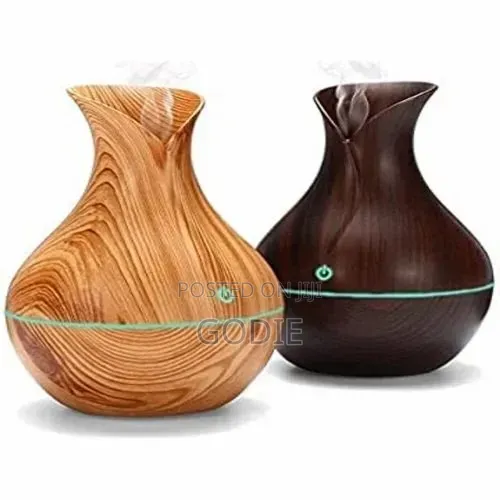 130ml Ultrasonic Aroma Diffuser With a Light Wood Grain Finish.