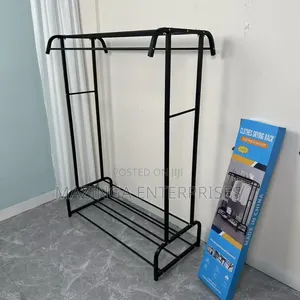 Metal Freestanding Garment Rack With Top and Bottom Storage Shelves