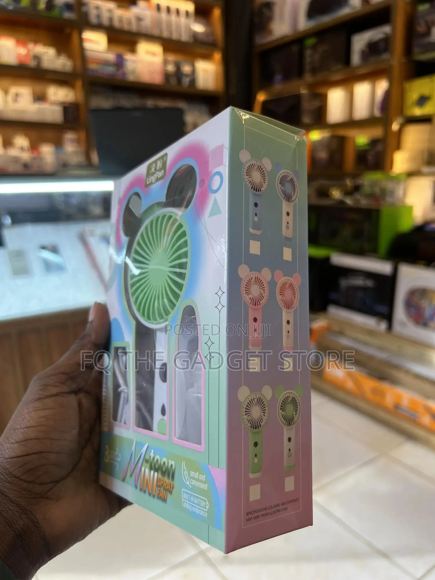 Portable Mini Fan With a Mist Spray Function.