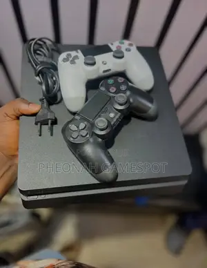 Gaming Console. Playstation 4 Slim Ps4 With 2 Controllers and 12 Games