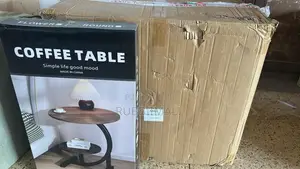 C - Shaped Coffee Table