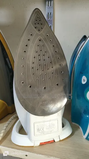 Uk Used Tefal Turbo Pro Anti-Calc Steam Iron in White and Gold.
