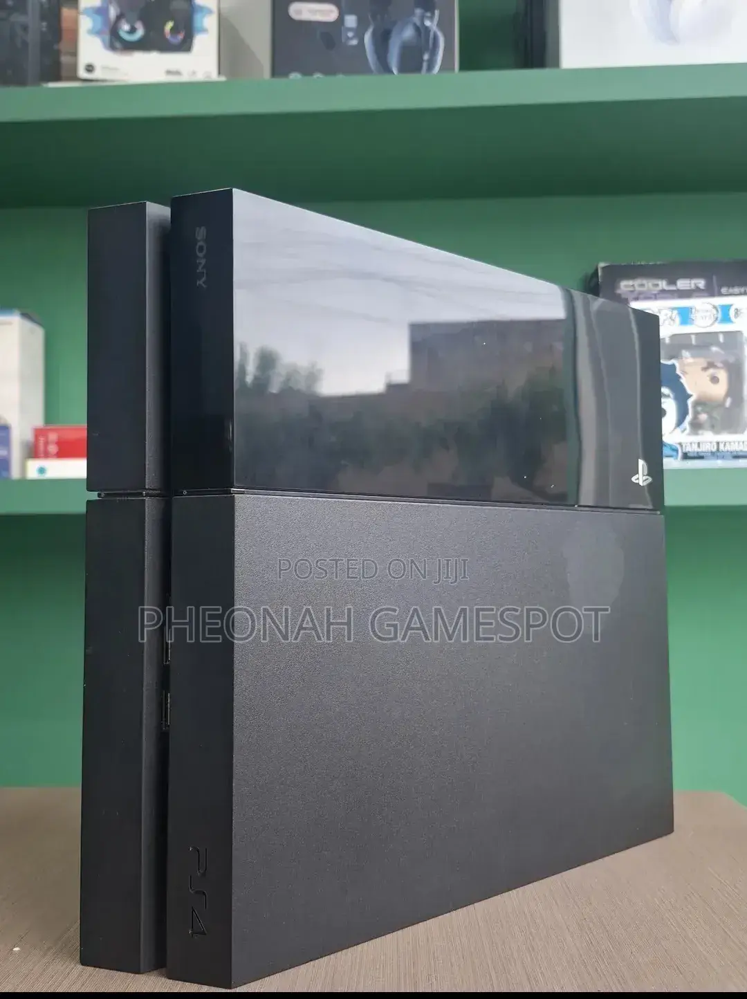 Playstation 4 Fat: 2 Pads, 12games to Make You Forget Kampala Potholes