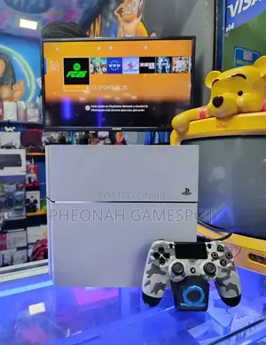 White Ps4 Standard With 2 Controllers, 12 Games. High Quality Consoles