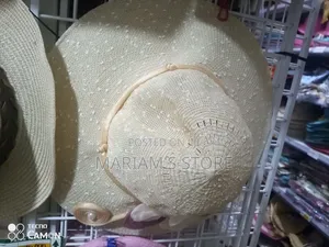 Summer Straw Sun Hats Featuring Wide Brims and Decorative Bands.]