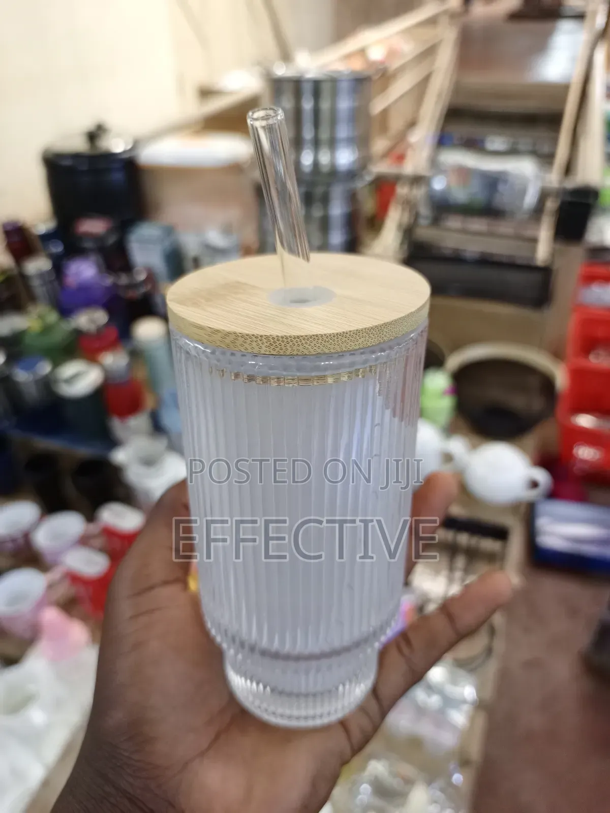 Ribbed Glass Tumbler With a Natural Bamboo Lid and Glass Straw.