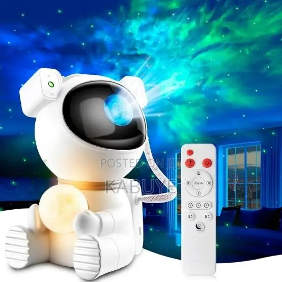 Sitting Astronaut-shaped Galaxy Star Projector Lamp.