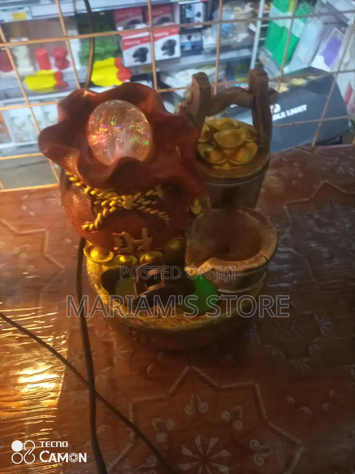 Water Fountain With a Golden Toad and a Rotating Crystal Ball.