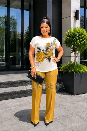 A White Short Sleeve T Shirt With a Mustard Yellow Wide Leg Pant