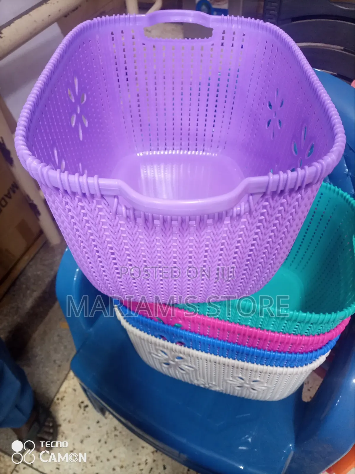 Plastic Laundry Basket With a Woven Pattern.