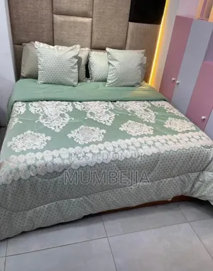 Mint Green Duvet With a White Floral Damask Pattern