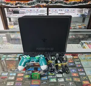 Ps4 Slim Chipped: 12 Games, 2 Pads. It's Original, No Fake Things Here