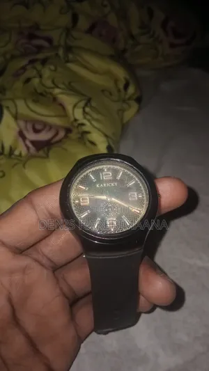 Karicky Brand Analog Watch With a Textured Dial and a Silicone Strap.