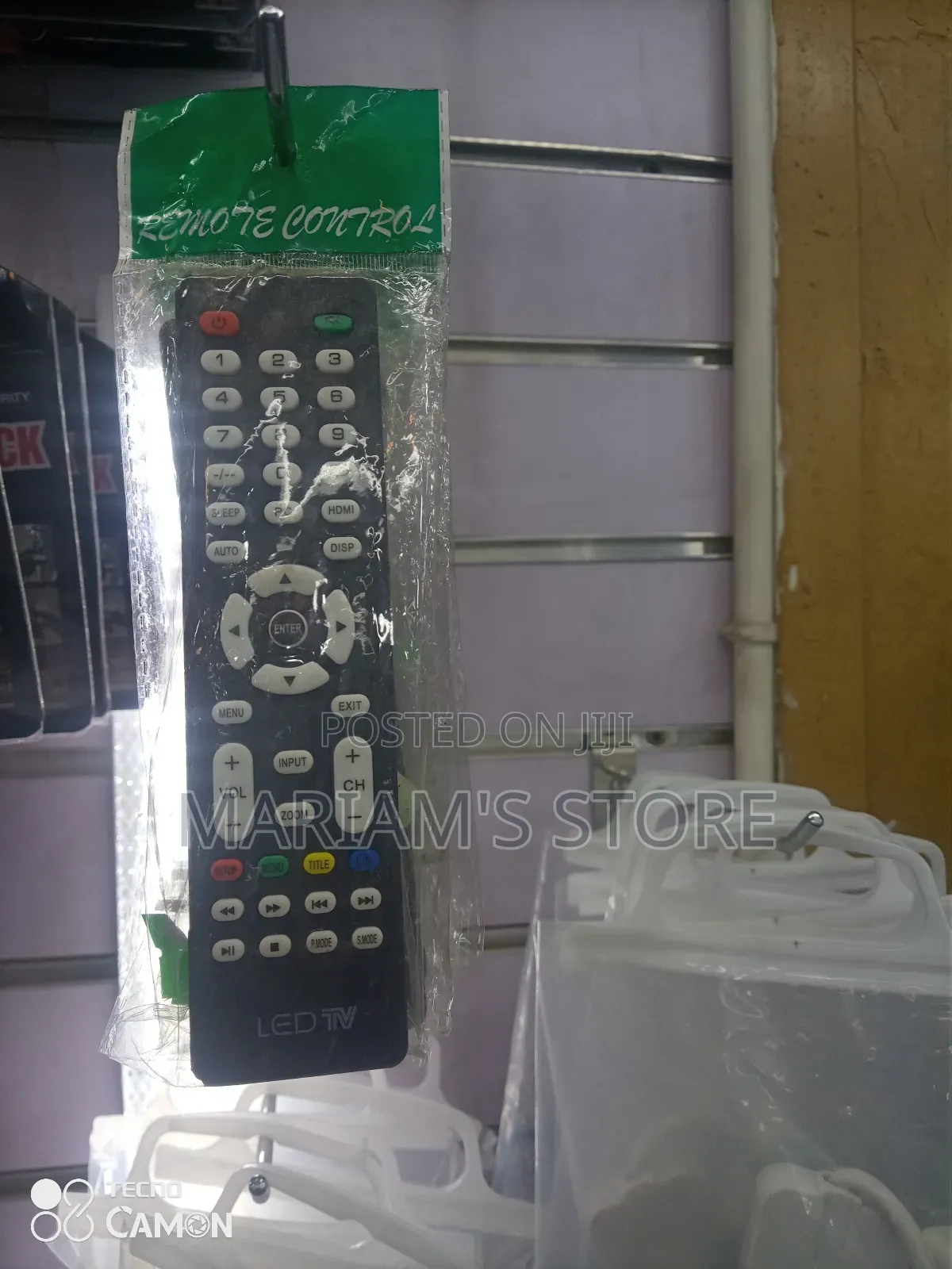 Black Universal Led Tv Remote Control Packaged in a Plastic Bag.