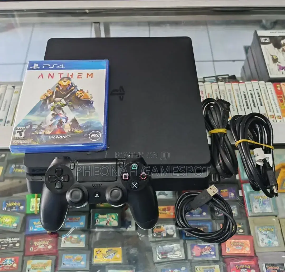 Playstation 4 Slim: Comes With 12 Games to Make You Forget Your Debts.