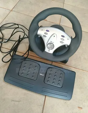 Uk Trust Nf340 Race Master Steering Wheel and Pedal Set for Pc Gaming.