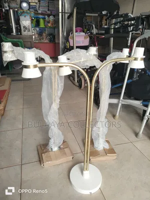 Uk Modern Brass-Plated Ceiling Light Fixture With a Two-Arm Design.
