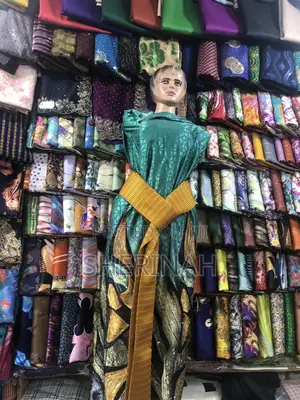 A Gomesi With a Kitambala
