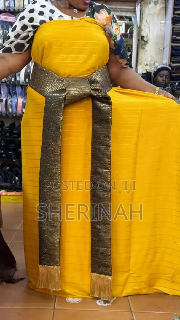 A Gomesi With a Kitambala