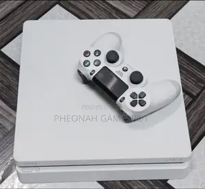 Chipped White Ps4 Slim With Over 10 Games and 2 Controller. Play Daily