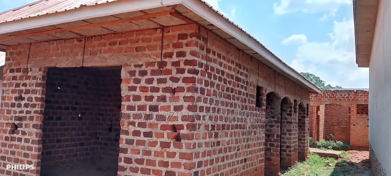 Three Semi Finished Rentals With Shop Forcedsale Heart of Nansana Town