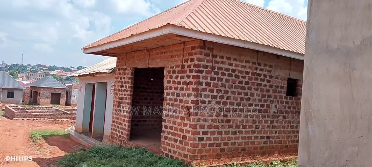Three Semi Finished Rentals With Shop Forcedsale Heart of Nansana Town