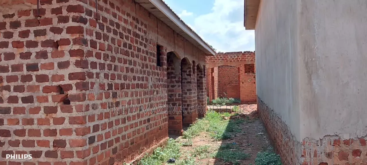 Three Semi Finished Rentals With Shop Forcedsale Heart of Nansana Town