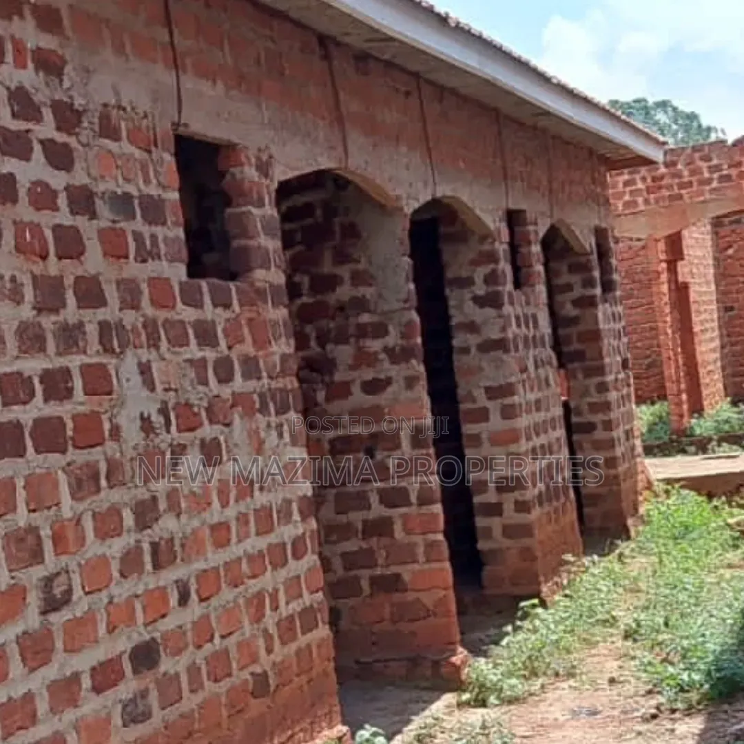 Three Semi Finished Rentals With Shop Forcedsale Heart of Nansana Town