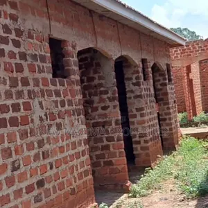 Three Semi Finished Rentals With Shop Forcedsale Heart of Nansana Town