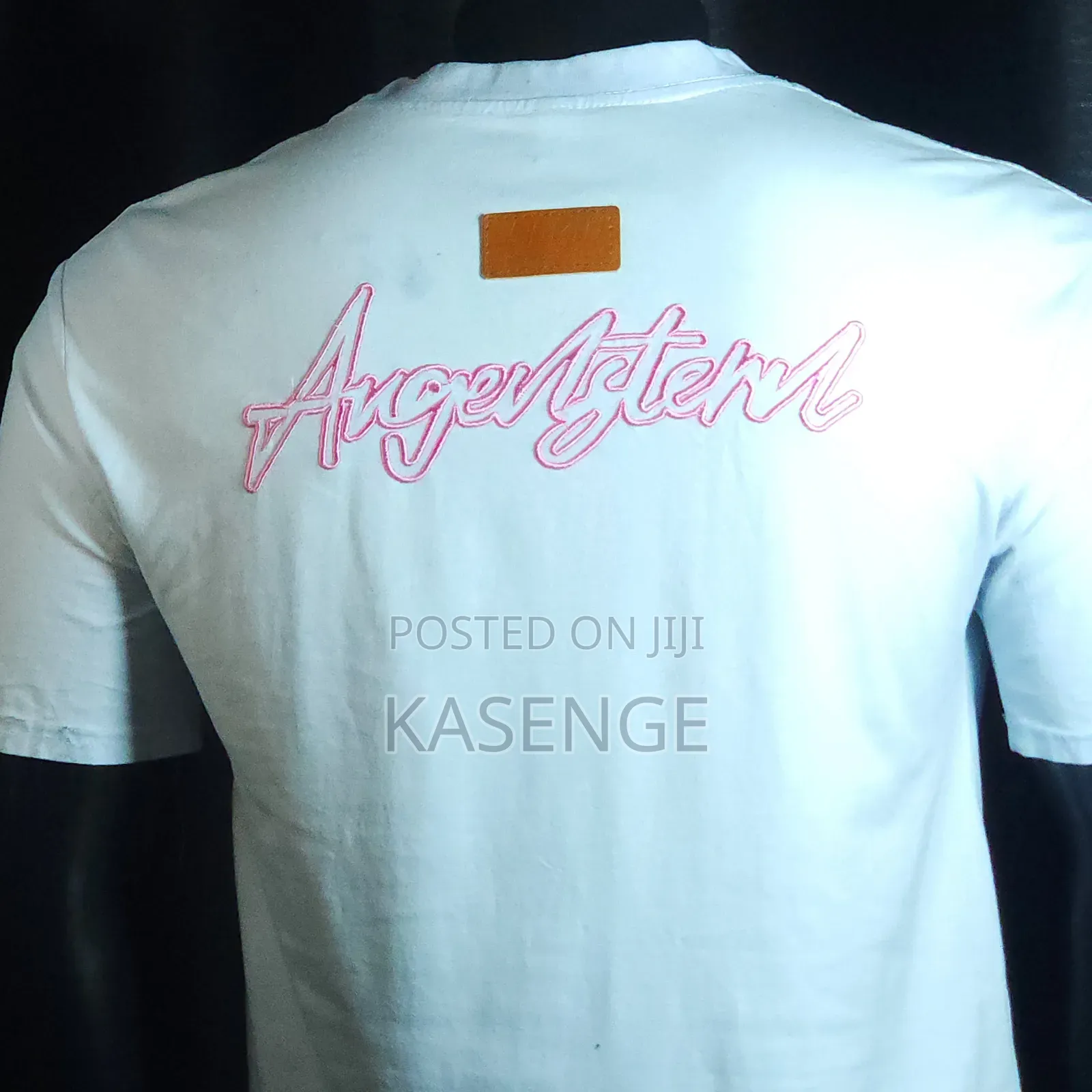 Light Sky Blue Graphic Tshirt Ft a Bk Id Patch On The Left Chest.