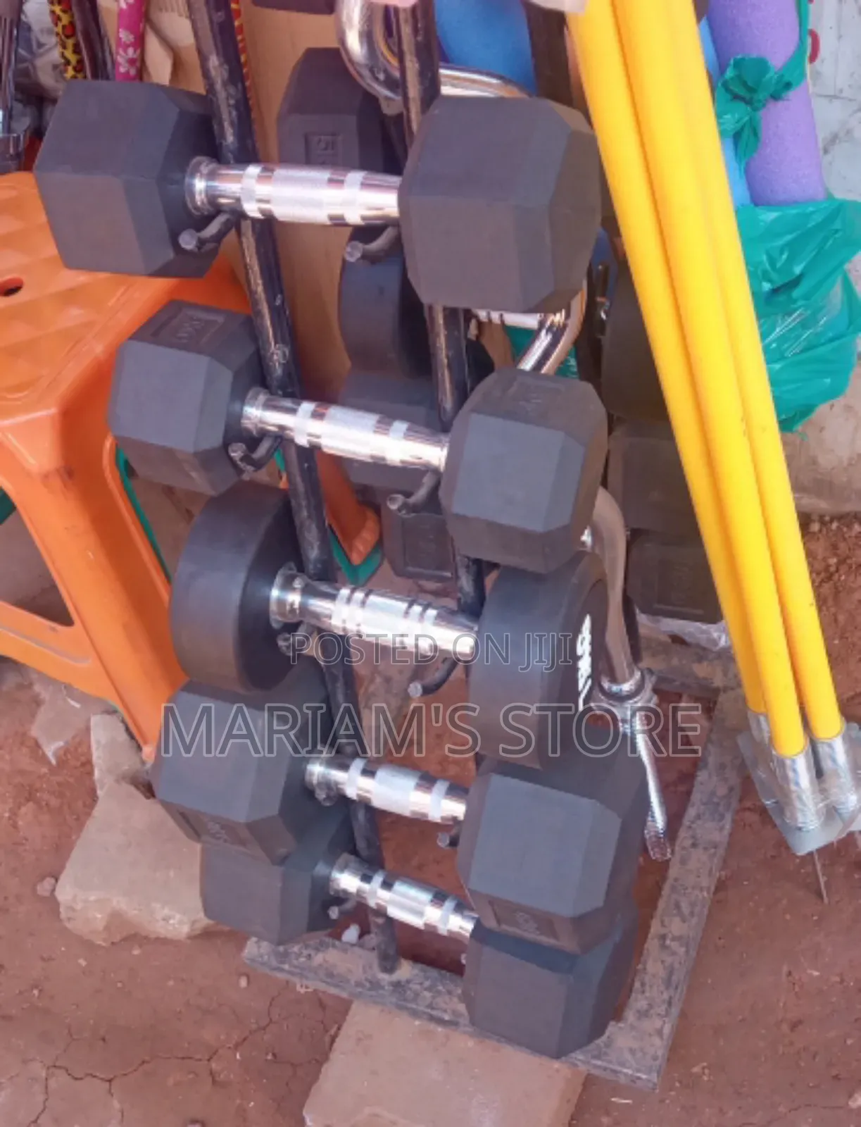 Rubber Coated Hexagonal Dumbbell Set With a Storage Rack]