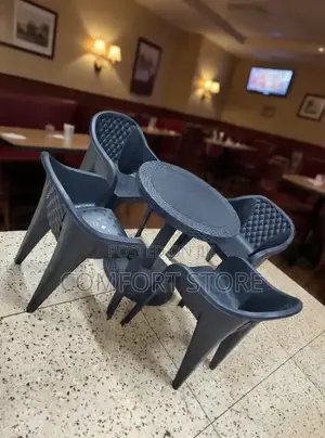 4 Morden Plastic Dinner Chairs and Table in Black Color