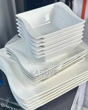 White Ceramic Dinnerware Set With Square Plates and Bowls.