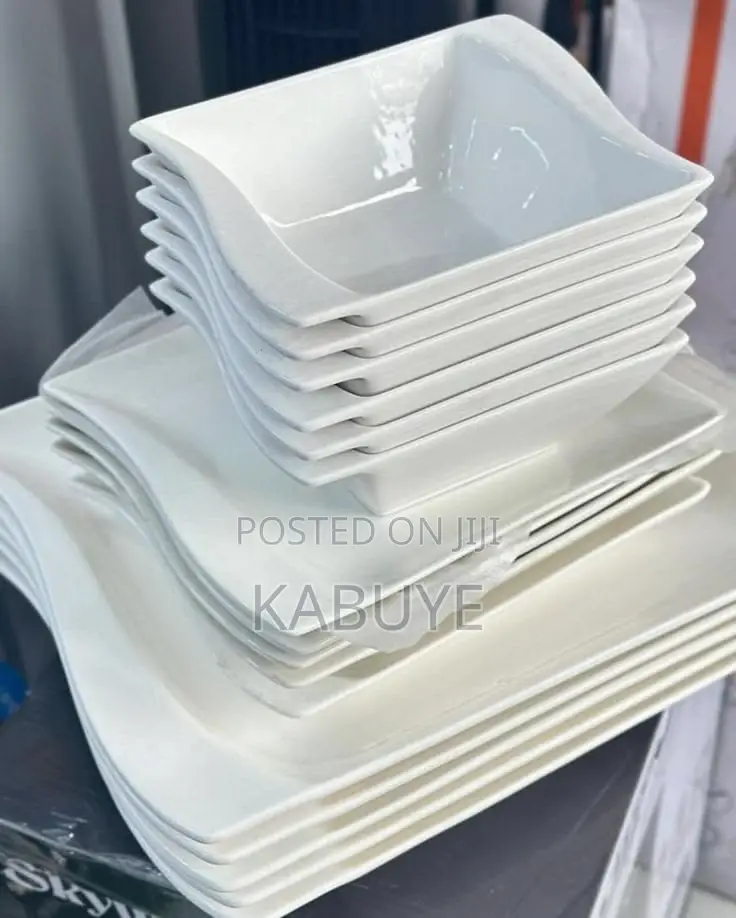White Ceramic Dinnerware Set With Square Plates and Bowls.