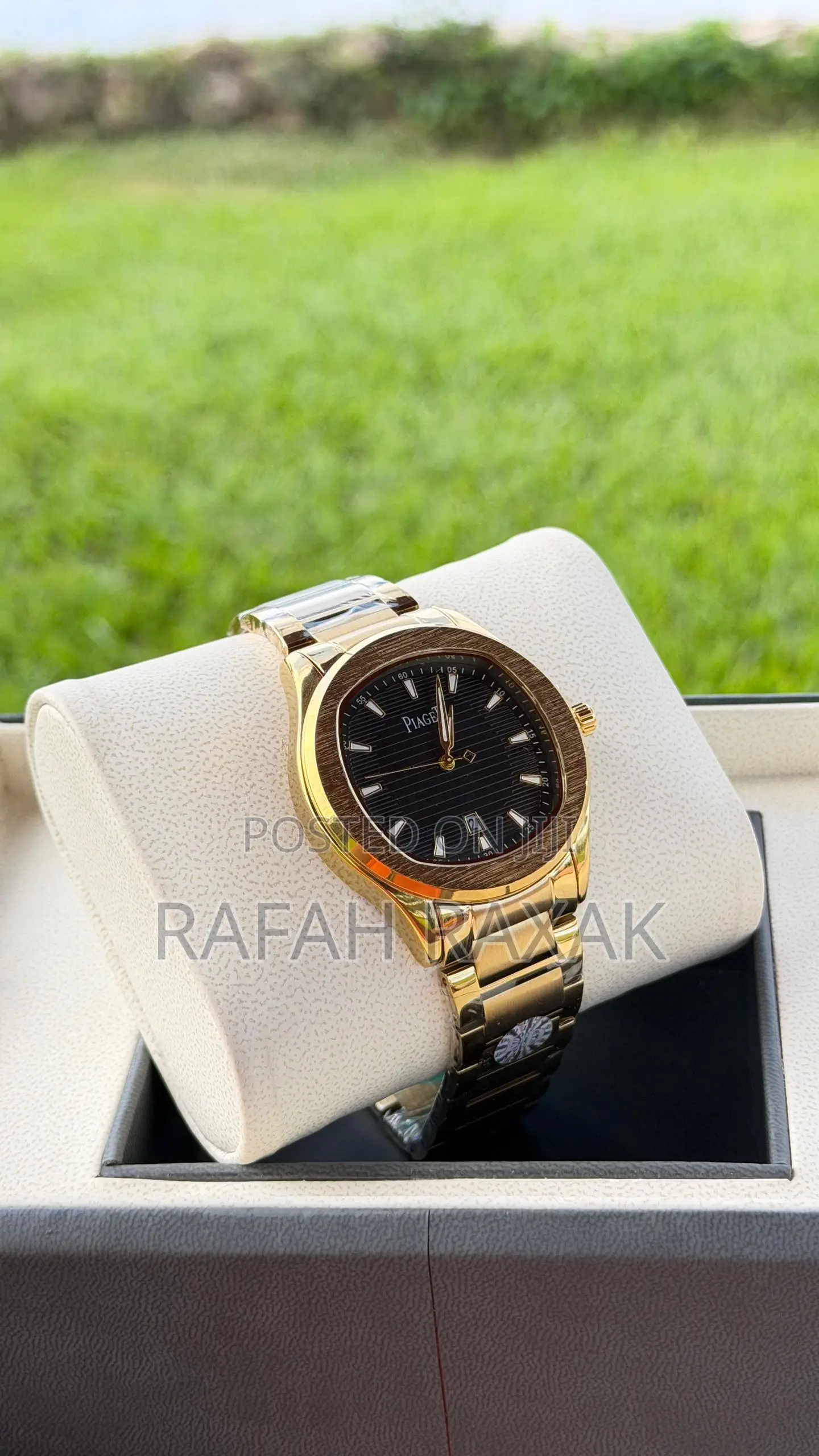 Black Dial and Gold Strap Piaget Timepiece