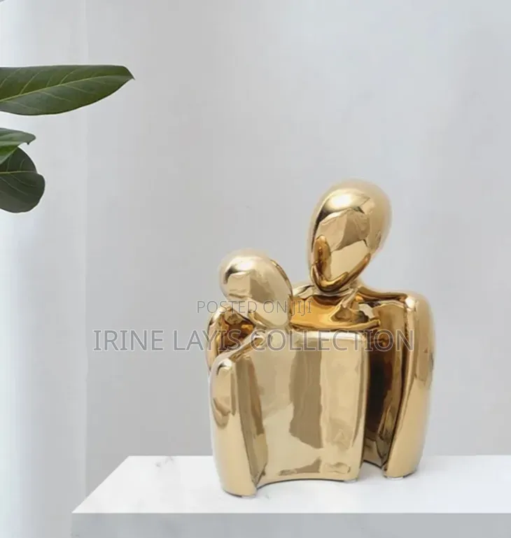Abstract Ceramic Embracing Couple Statue.